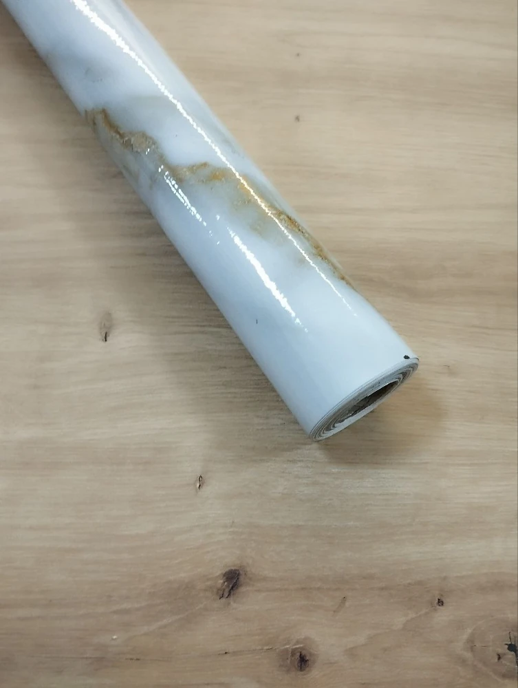 Маслостійка самоклеюча плівка під мармур 60 см*1 м МА058